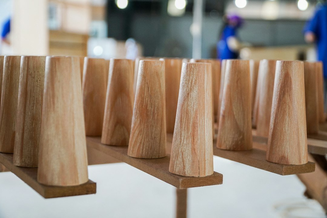 a-group-of-wooden-cones-sitting-on-top-of-a-table-lzo13e-sibs